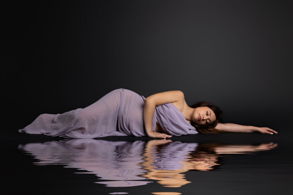 Elegant maternity portrait with water reflection photographed by Fresno maternity photographer in Central Valley