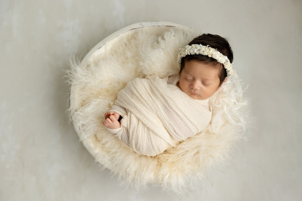 Neutral newborn portrait wrapped in cream tones by Fresno newborn photographer Stephanie Leal Photography